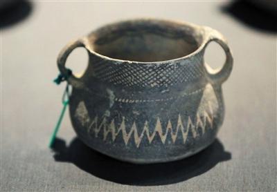 马家窑文化陶罐是马家窑文化的精品之作。新京报记者 浦峰 摄